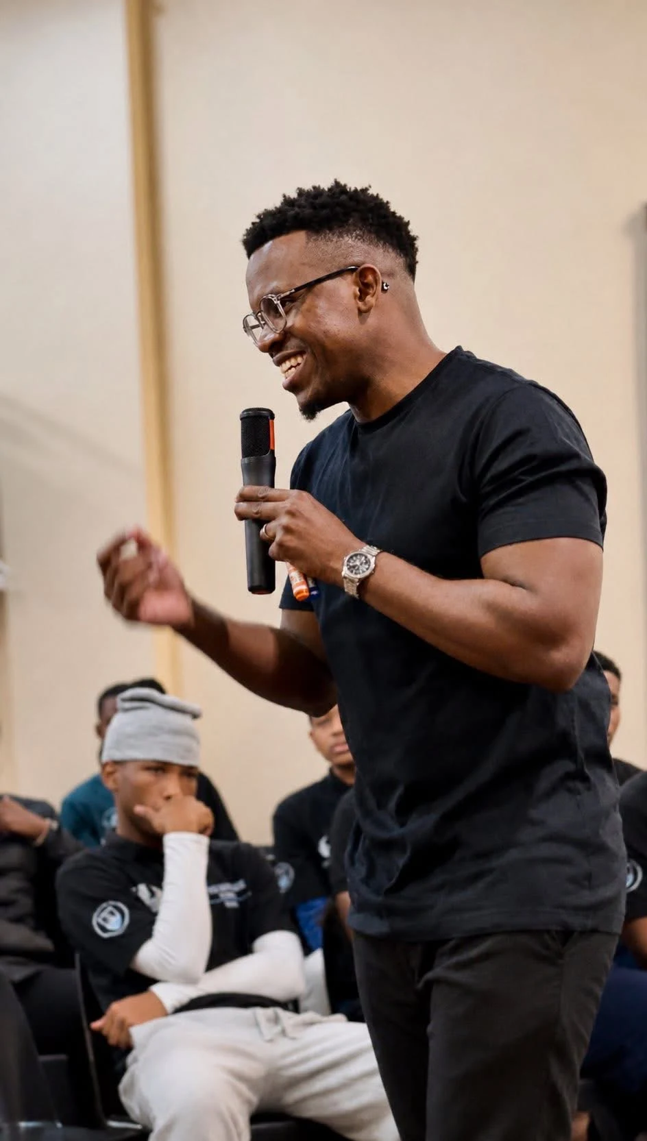 Phinius Sebatsane smiling in conversation.