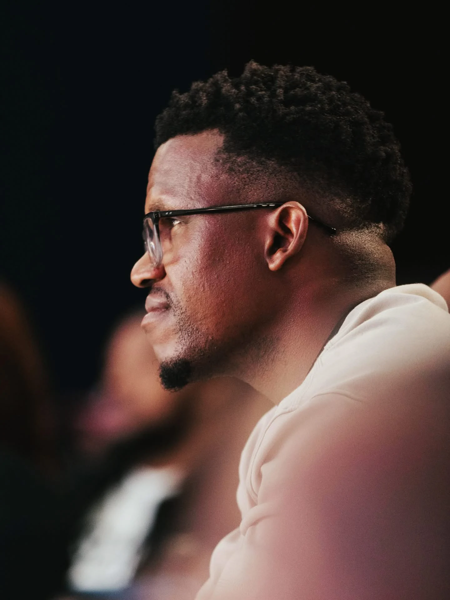 Phinius Sebatsane listening in profile.